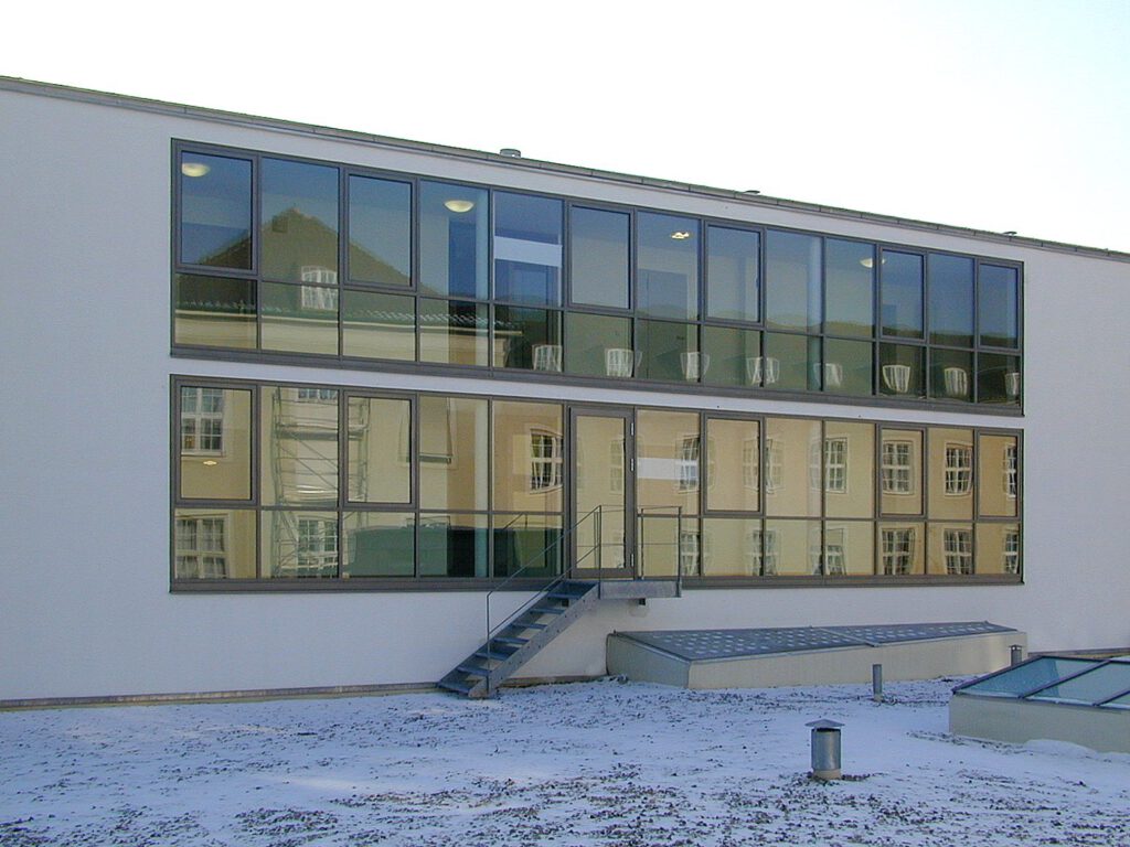 Beckerstraße Ingolstadt – Erdgeschosszone mit Läden und Arkaden